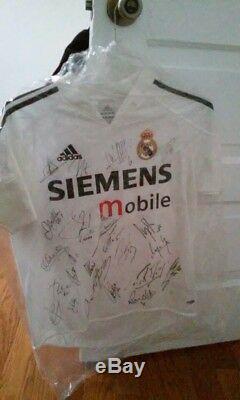 2005 Autographed Real Madrid Jersey. Signed by David Beckham, Ronaldo, Figo