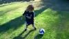 Eli Playing Soccer In His Real Madrid Jersey