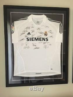 Real Madrid autographed jersey. Framed and double matted COA 04/05 Ronaldo